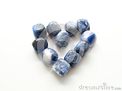 Heart of Tumbled jasper stones for crystal therapy treatments an Stock Photo