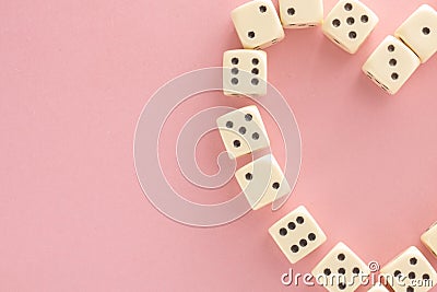 Heart. White gaming dices on pink background. victory chance and lucky. Flat lay style, place for text. Top view and Close-up cube Stock Photo