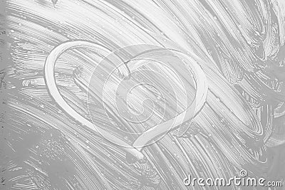 heart on the window with glass cleaner, foam stains Stock Photo