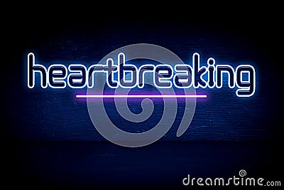 Heartbreaking - blue neon announcement signboard Stock Photo