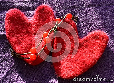 Hearts and beads on a purple background Stock Photo