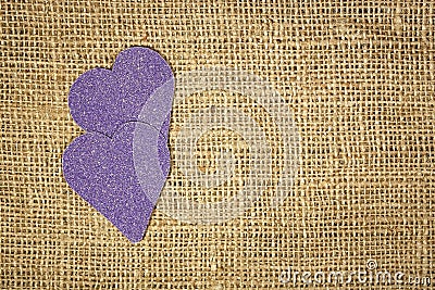 Hearts on burlap Stock Photo