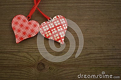 Hearts on Wooden Texture. Valentines Day background Stock Photo