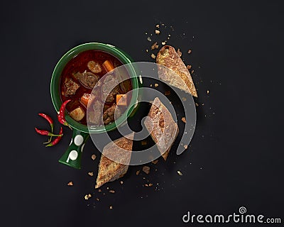Goulash soup with bread and chilli Stock Photo