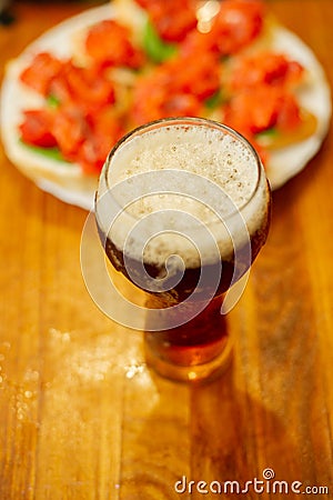 Hearty snack with different kinds of spreads on farmhouse bread served with a fresh yeast wheat beer Stock Photo