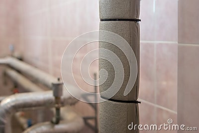 Thermal insulation of pipes in the room, heating system, cooling Stock Photo