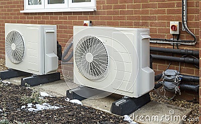 Heat pump installation on a modern house Stock Photo