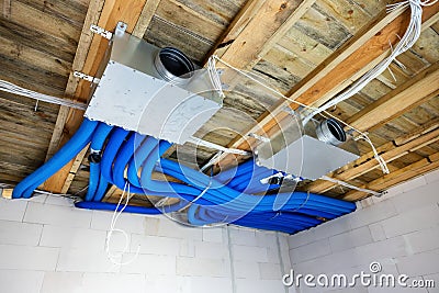 Heat recovery ventilation system installation in new house. air filtration Stock Photo