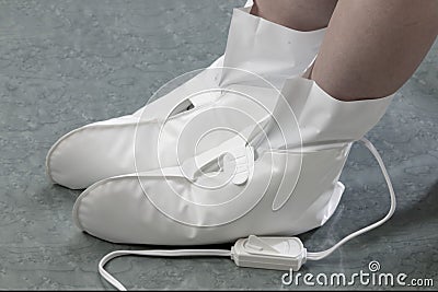 Heated massage booties Stock Photo