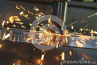 The heating chip on CNC machining centre from tool wear. Stock Photo