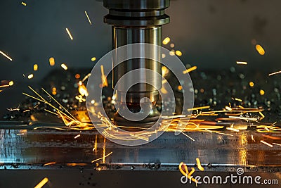 The heating chip on CNC machining centre from tool wear. Stock Photo