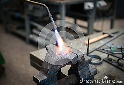 Heating metal object closeup Stock Photo