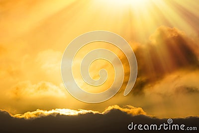 Heavenly light. Spritual sunbeam above clouds Stock Photo
