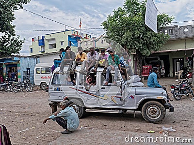 Heavily loaded with Passenger Jeep being used as a taxi Editorial Stock Photo