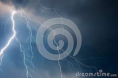 Heavy clouds bringing thunder lightnings and storm Stock Photo
