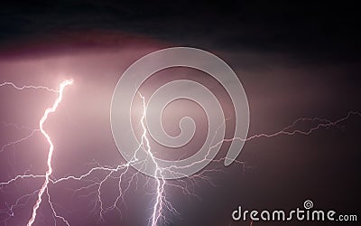 Heavy clouds bringing thunder lightnings and storm Stock Photo