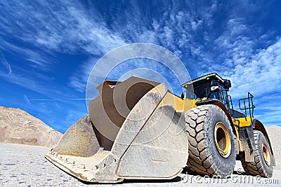 Heavy construction machine in open-cast mining - wheel loader tr Stock Photo