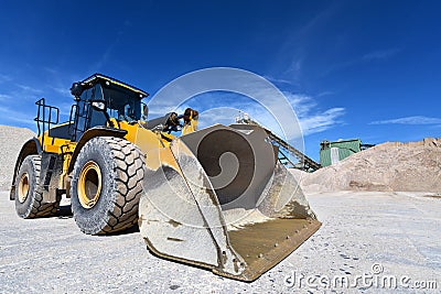 Heavy construction machine in open-cast mining - wheel loader tr Stock Photo