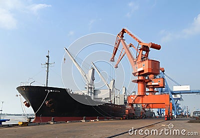 Heavy cranes in the harbor Stock Photo