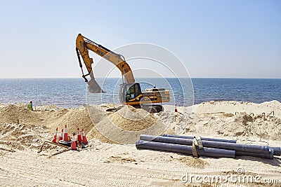 Heavy duty vehicle at the construction site along the road between Dubai and Sharjah. Editorial Stock Photo