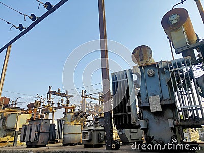Transformers and many electrical equipments in a small power hub Stock Photo