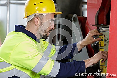 heavy equipment mechanic operator checking problem Stock Photo