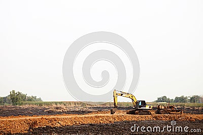 Heavy excavating equipment at construction site. Stock Photo