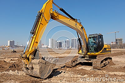 Heavy excavator at construction site Stock Photo