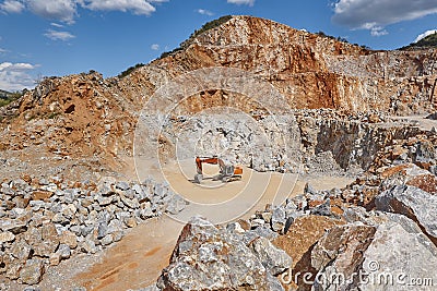 Heavy excavator on a quarry. Excavation machinery. Earthmover work Stock Photo