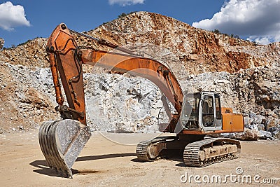 Heavy excavator on a quarry. Excavation machinery. Earthmover work Stock Photo