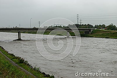 Heavy flood at the rhine river in Bendern in Liechtenstein Editorial Stock Photo