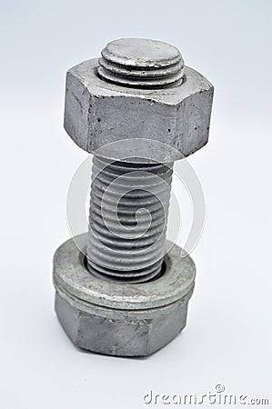 Heavy metal bolt, nuts and washers, tools equipment. Stock Photo