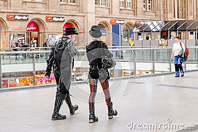 Heavy Metal guys fans, metalheads walk at the railway station. Gothic Leipzig annual festival Editorial Stock Photo