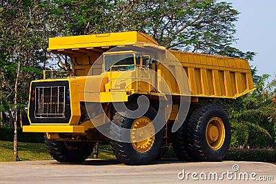 Heavy mining truck in mine and driving along the opencast. Photo of the big mine truck, The career heavy-load super car Stock Photo