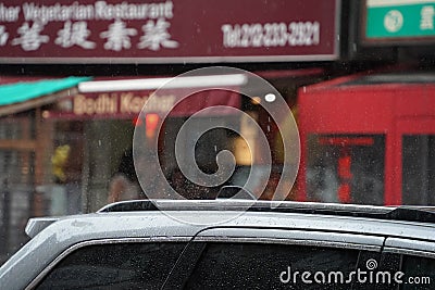 Heavy rain in chinatown new york city Editorial Stock Photo