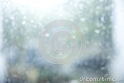 Raindrops looking through the glass Stock Photo