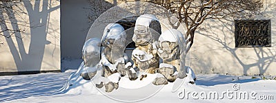 Stone Lions in the Snow Stock Photo