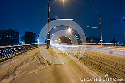 Snowbound city street at night Stock Photo
