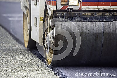 Heavy Vibration roller compactor at asphalt pavement works for road and highway construction Stock Photo