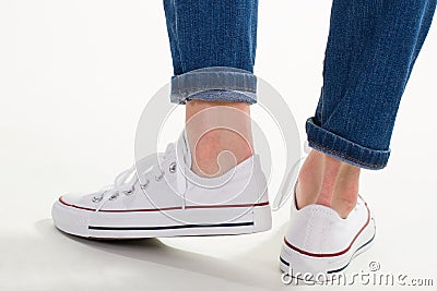 Heels of white of gumshoes. Stock Photo
