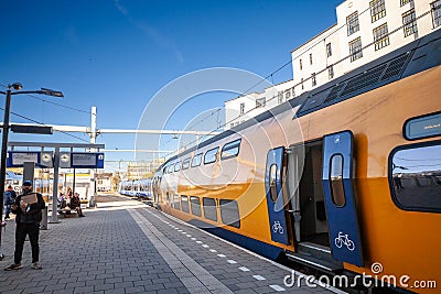 HEERLEN, NETHERLANDS - NOVEMBER 10, 2022: : Selective blur on double decker regional train of Nederladse Spoorwegen in Heerlen Editorial Stock Photo