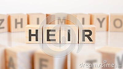 HEIR - word on wooden cubes on white background Stock Photo