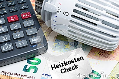 Heizkosten prÃ¼fen. Konzept mit Heizthermostat, Taschenrechner und Euro Banknoten Stock Photo