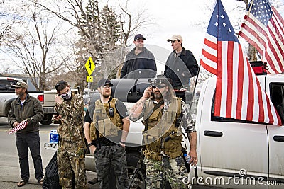 Helena, Montana - April 19, 2020: Yellowstone Militia of Billings, armed group of men carrying guns and weapons, protecting Editorial Stock Photo