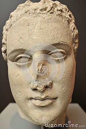 A Helenistic nobleman statue dated 200 AD exhibited at the British Museum in London , United Kingdom Editorial Stock Photo