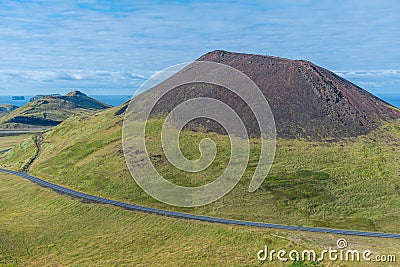 Helgafell volcano situated at Heimaey island in Iceland Stock Photo