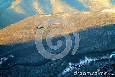 Heli ski service helicopter winter mountain aerial view in Krasnaya Polyana. Stock Photo