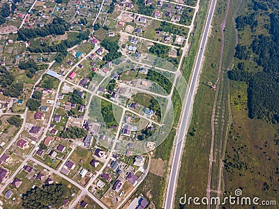 Helicopter drone shot village with road Stock Photo