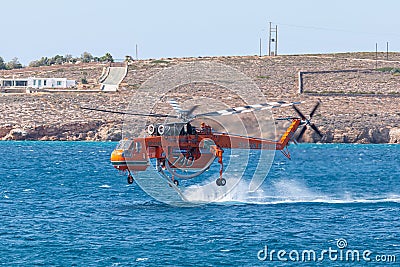 A helicopter of the fire brigade, Paros, Greece Editorial Stock Photo