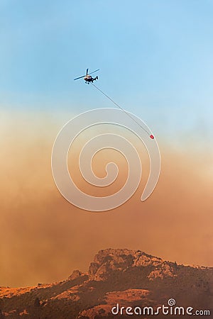 Helicopter Firefighters Fighting a Fire Stock Photo